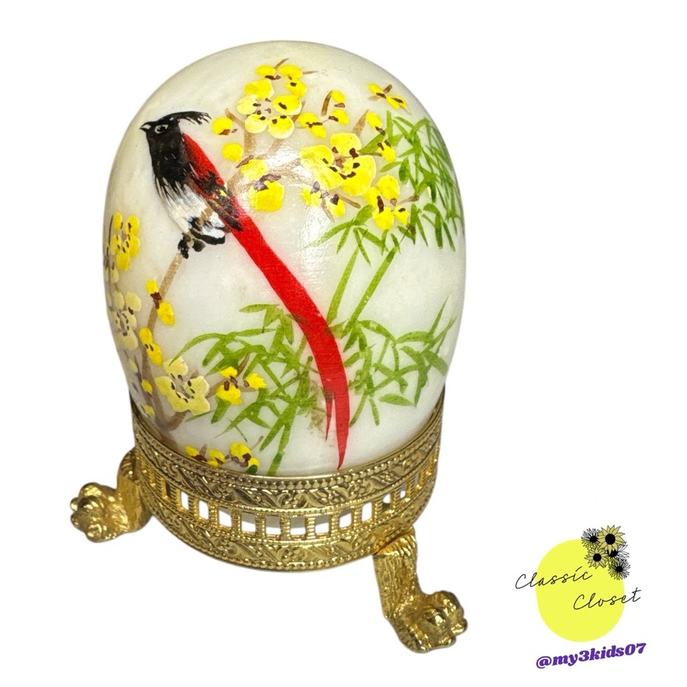Vintage polished stone eggs with hand painted bird and floral designs.